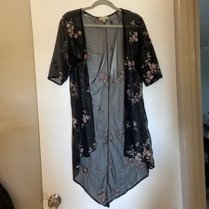 Black sheer and embroidered floral design size medium